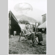Soldier in folding chair (ddr-densho-1007-864)