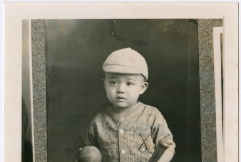Henry Date dressed in a baseball outfit (ddr-densho-353-206)