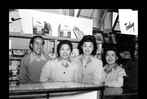 Kay Watanabe and T. Shiino in the canteen, Amache Co-op (ddr-csujad-55-1554)