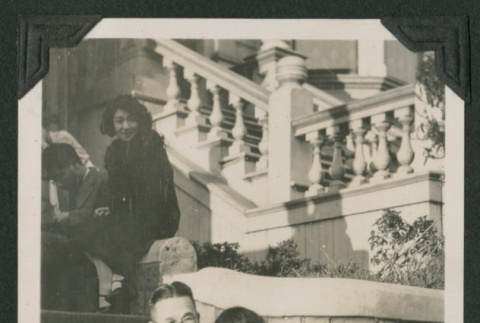 man and child sitting on steps (ddr-densho-378-553)