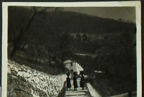 Silhouettes of chlidren on a narrow path (ddr-densho-201-395)