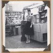 Man and woman by a music display (ddr-densho-542-103)