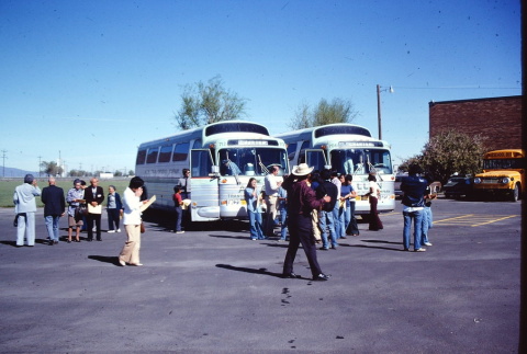 Pilgrims waiting to board buses (ddr-densho-294-29)