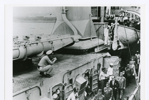 Japanese dignitaries returning to the destroyer Landsdowne after signing surrender documents (ddr-densho-1007-94)