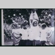 Young children in front of statue of Mary (ddr-densho-330-120)