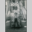 Agnes Sakura with boy on swing (ddr-densho-523-213)