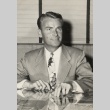 Man sitting at his desk (ddr-njpa-2-293)