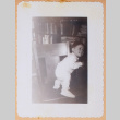 Photo of an infant on a chair (ddr-densho-483-486)