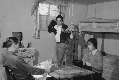 Ninomiya family in their barracks room at Granada incarceration camp (ddr-csujad-14-3)