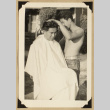 Gary Kikawa gets a haircut (ddr-densho-542-580)