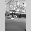 Movie theater with traffic police in intersection (ddr-densho-426-2412)