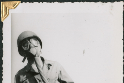 Man wearing gas mask (ddr-densho-434-322)
