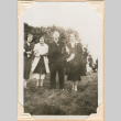 Photo of man and three women standing on lawn (ddr-densho-341-97)