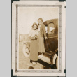 Two women by car (ddr-densho-316-183)