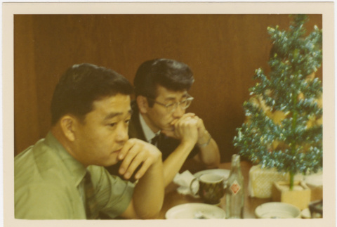 Two men seated at a table (ddr-densho-426-159)