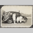 Three people and a car (ddr-densho-326-614)