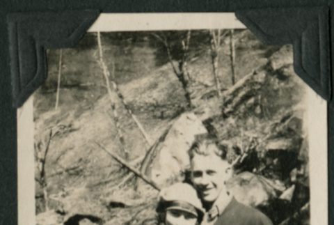 Man and woman pose on hike (ddr-densho-359-561)