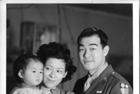 Nisei serviceman with wife and daughter (ddr-densho-37-751)