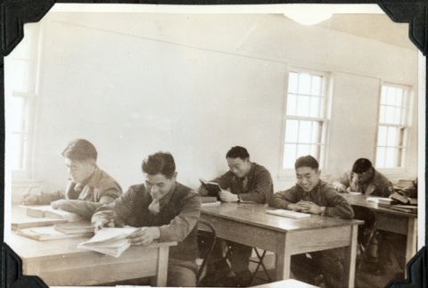 Men sitting at desks (ddr-ajah-2-427)