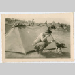 Soldier shaving in front of tent (ddr-densho-368-139)