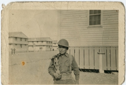 Nisei soldier with gas mask (ddr-densho-325-131)