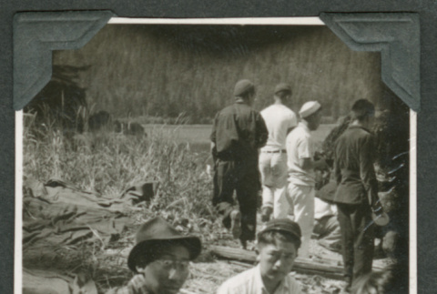 2 men sitting and eating (ddr-densho-540-75)