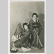 Two young women posed in kabuki makeup and costume (ddr-densho-383-437)