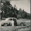 Chester Sakura Jr with woman standing by car (ddr-densho-523-209)