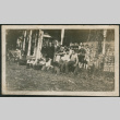 Group posing on porch of house (ddr-densho-293-201)