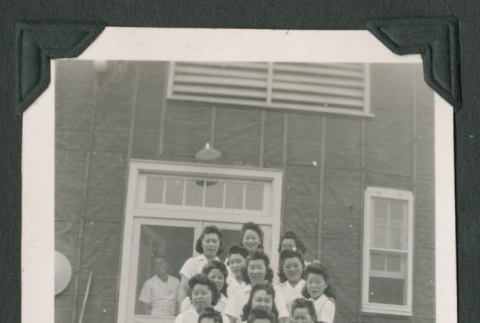 Fourteen women on steps (ddr-densho-471-77)