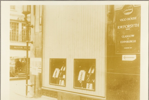 Sign for an air raid shelter posted next to a department store display (ddr-njpa-13-251)