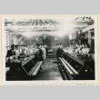News Courier staff at dining tables (ddr-densho-37-1911)