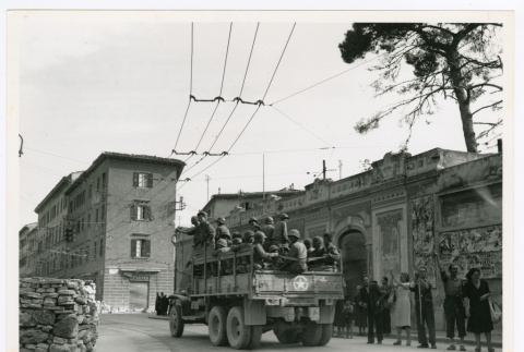 100th Infantry Battalion troops traveling through Livorno area of Italy (ddr-densho-1007-147)
