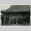 Mitsuye Yabe and Tour Group Posing in Front of Building (ddr-ohs-1-129)
