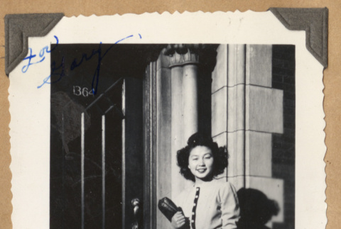Kaye on a doorstep (ddr-densho-542-85)