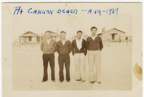 Four men at the beach (ddr-densho-388-19)