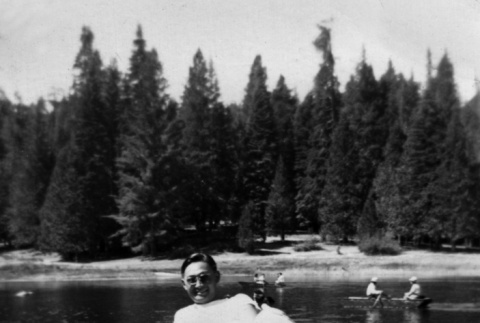 Stan Nagata on a dock at Lake Sequoia (ddr-densho-336-43)