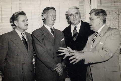 W. Harold Loper, Gregg M. Sinclair, Urban E. Wild and a National Education Association president (ddr-njpa-2-1159)