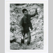 Man walking with stick (ddr-densho-1007-368)