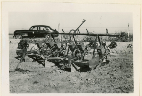 Side view of a seed planter (ddr-densho-37-1318)