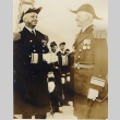 Two men in uniform shaking hands (ddr-njpa-1-2422)