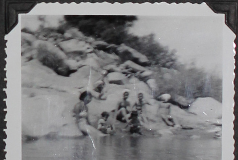 A family swimming (ddr-densho-300-472)
