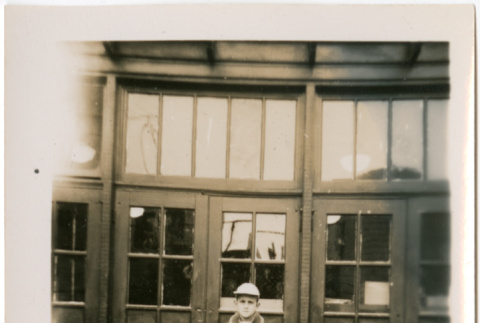 Boy standing outside building (ddr-densho-426-1128)