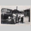 Four women standing by car (ddr-densho-464-99)