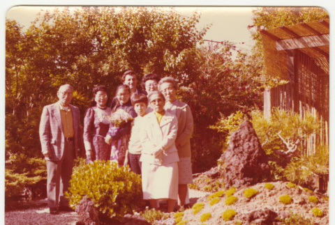 Group photograph in a garden (ddr-densho-433-575)