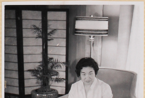 Woman sitting in armchair (ddr-densho-522-67)