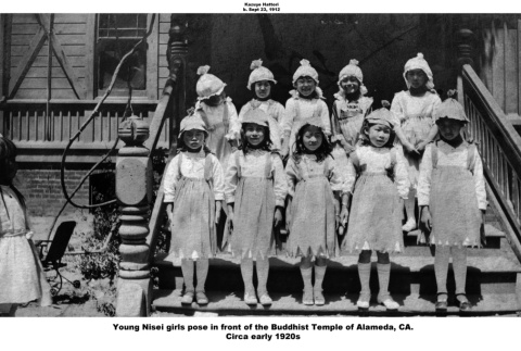 Group of girls in matching costumes standing on steps (ddr-ajah-3-212)