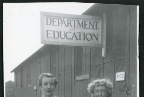 Photograph of Lucille Bouche in front of the Department of Education (ddr-csujad-47-168)