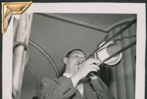 Jackson Teagarden playing the trombone (ddr-densho-434-124)