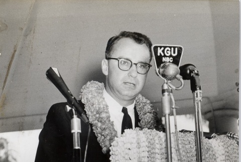 William F. Quinn speaking into microphones at a podium (ddr-njpa-2-1012)